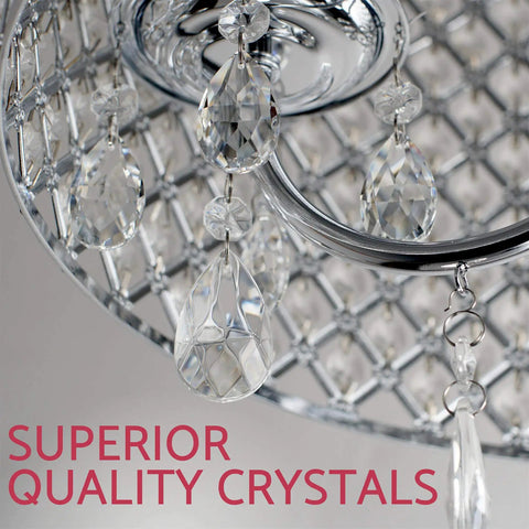 Close-up of Briolette 16 Inch Four Light Crystal Chandelier With Round Beaded Drum Shade showcasing teardrop crystals.