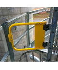Heavy Duty Self Closing Pool And Child Safety Gate Hinges With Alignment Legs For Metal Gates Chrome Finish installed on industrial scaffolding.
