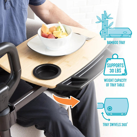 Adjustable Bamboo Tray Table With Ergonomic Safety Handle And Stand, shown with fruit bowl and cup holder, supports up to 250 pounds.
