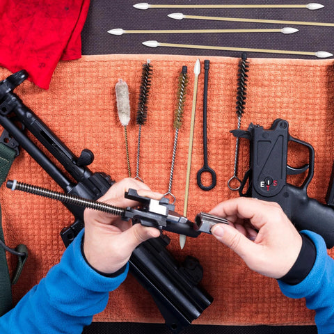 Gun cleaning cotton swabs on bamboo sticks with double-pointed tips for firearms maintenance