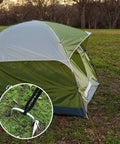 Tent secured with 200 Pack 8 Inch Landscape Staples Heavy Duty 11 Gauge Galvanized Steel Garden Stakes U Shaped Pins shown in use.