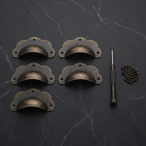 Super Sturdy Vintage Bronze Shell Cup Pulls For Cabinets And Drawers Dead Simple Install Iron Hardware Set on dark surface with screws and screwdriver.