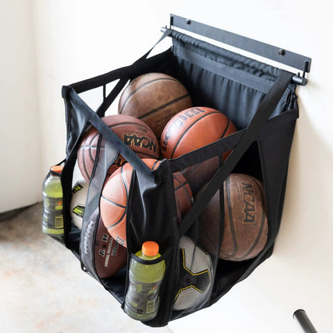 Heavy Duty Basketball Wall Mount Rock Solid Sports Ball Rack holding various sports balls and drinks, 20x18x22 in metal frame.