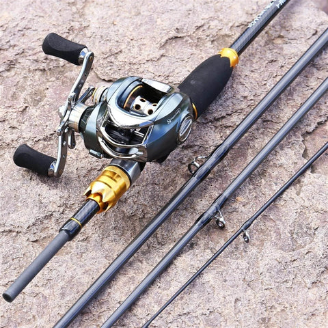 Fishing Rod And Baitcasting Reel Combo 4 Section Carbon Casting Rod with ergonomic non-slip handle on rocky surface.