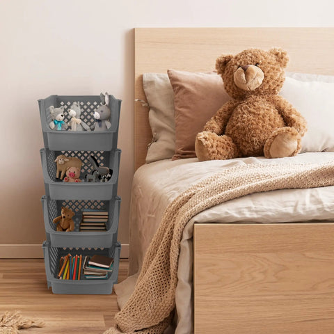 Stackable Plastic Storage Bins 4 Piece Gray Set For Home And Kitchen Open Front Design by a bed with teddy bears and books.