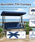 Three Seat Outdoor Porch Swing Glider With Adjustable Canopy Convertible Patio Bed Upgraded Folding Cup Holders Thick Cushions Cozy Up In The Backyard Garden Poolside Blue on a wooden patio by the sea with greenery and icons showcasing features like UV resistance and anti-fading.