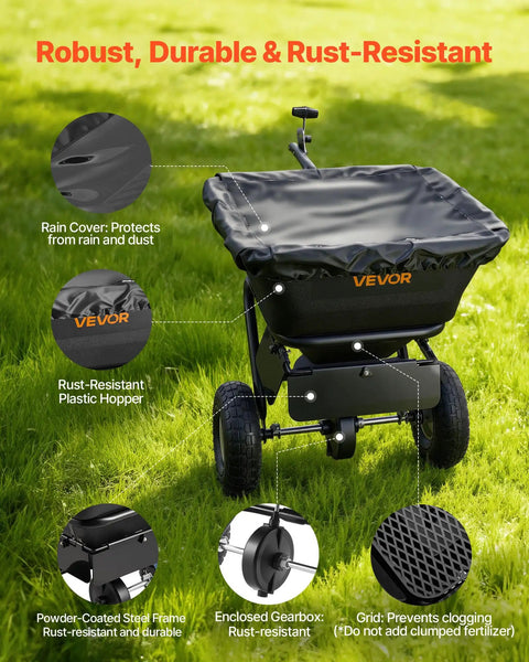 Tow Behind Lawn Spreader For Seed Fertilizer Ice Melt, 9.8 Foot Spreading Width, 85 Lb Hopper, 10 Inch All Terrain Tires, Adjustable Flow Control, Broadcast Spreader Pro Grade For Yard Work And Lawn Care on grass