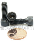 One Hundred Pack 1/4 20 By 3/4 Inch Socket Head Cap Screws Crafted From Top Shelf Alloy Steel With A Durable Thermal Black Oxide Finish Built Tough And Hella Rugged For Straight Up Pro Mechanic Jobs with a penny for size comparison.