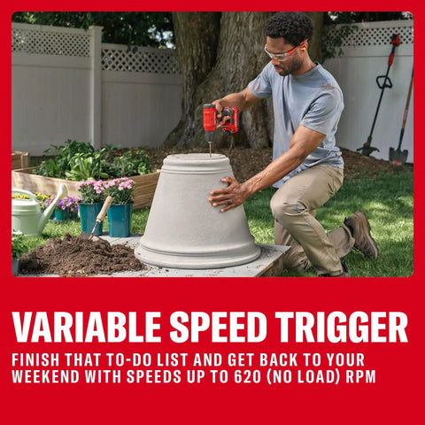 A person using the Badass 3/8 Inch Cordless Drill Driver with Battery And Charger Included for a DIY project outdoors.