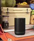 Move 2 Black Portable Bluetooth Speaker With Dual Tweeters for Rich Stereo Sound on truck tailgate at outdoor campsite