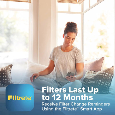 Woman using Filtrete app for 16x25x4 Refillable Air Filter Starter Kit, MPR 1550, MERV 12.