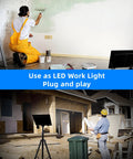 Person using Tough As Nails 120W Led Flood Lights Outdoor Rock Solid 14000 Lumens as a work light while painting indoors.