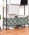 Game Changer Foldable Storage Bins For Shelves With Heavy Duty Steel Frame And Smooth Polyester Fabric Featuring Grab Handles Decorative Floral Organizers For Mess Free Home Organization in a shelving unit with pillows and blankets.