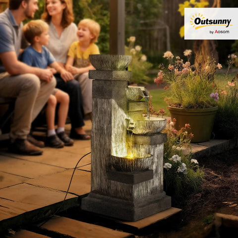 Four Tier Outdoor Water Fountain With LED Lights, 33.5 Inch Tall Resin Cascading Bowls Waterfall in a garden setting.