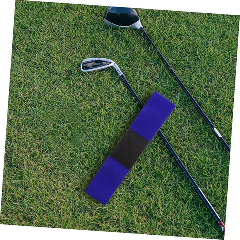 Two Piece Golf Swing Training Arm Strap Set on grass with golf clubs, a durable arm corrector for better swing form.