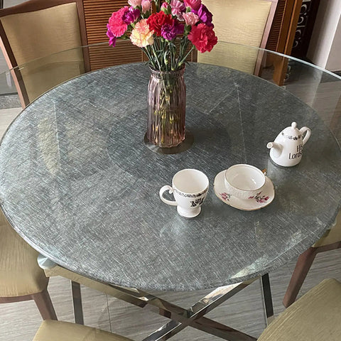 Slick Tempered Glass Lazy Susan Turntable For Dining Tables Smooth 360 Spin Rock Solid Heavy Duty Serving Tray with floral centerpiece.