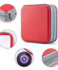 Slick Hard Plastic CD Case With Secure Slim Zipper Stores Forty Eight Discs, red waterproof organizer with zipper details.