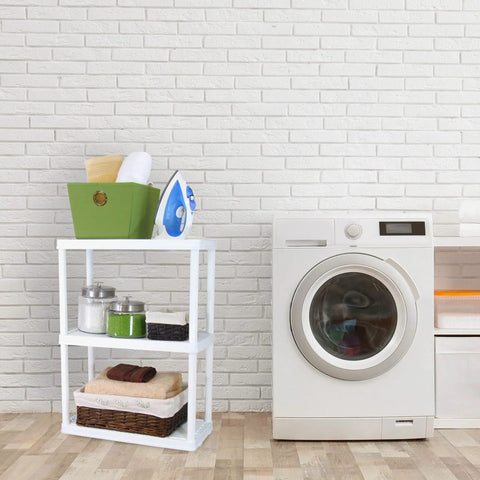 No Sweat 3 Tier Storage Shelving Units In Fresh White by a modern washer holding laundry essentials in a clean laundry room.
