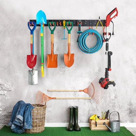 Heavy Duty Multi Storage Garage Hooks Wall Mounted Garden Tool Organizer Featuring Rock Solid Rails holding shovels, rakes, and hose.
