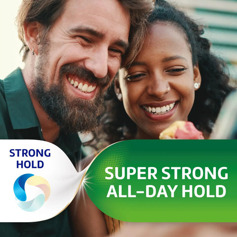 Smiling couple outdoors with strong hold sign for Original Denture Adhesive Cream With Strong All Day Hold No Slip Grip Food Seal And Comfort Zinc Free Mint Flavor Two Point Four Ounce Tubes Four Pack Great For Daily Wear And Reliable Smile Security All Day Long