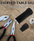 Kickass Motorcycle Mainshaft Nut Socket Wrench For Quick Twin And Primary Drive Sprocket Removal Hella Durable Bike Tool shown with pliers and table sign.