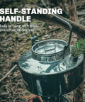 One Liter Lightweight Stainless Steel Camping Kettle Built Tough For Bushcraft And Outdoor Campfire Use hanging on a branch