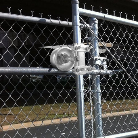 Heavy Duty Galvanized Steel Sliding Gate Rollers With Smooth Glide Design For Chain Link Fences Dual U Pipe Track Hardware Built To Last A Ton For Two Inch Frames And One Point Five Eight Rails Two Pack mounted on a chain link gate.