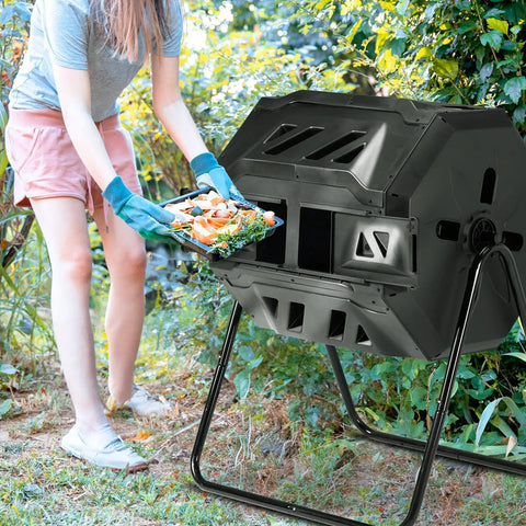 Person using Dual Chamber Rotating Compost Tumbler No-Fuss Spin For Continuous Cycle Composting, 42 Gallon Large Capacity Outdoor Bin