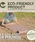 Person installing Natural Organic Paper Mulch Ground Cover Mat For Veggie Gardens Black 3 By 300 Feet on soil