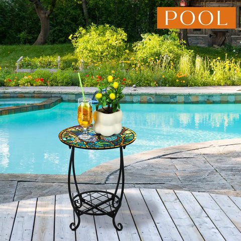 Outdoor Round Side Table 14 Inch Mosaic Butterfly Style Patio Accent Table by pool with plants and drinks on tabletop.