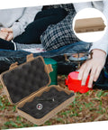 Outdoor Tool Box Multi Function Storage Case with shockproof survival container open on grass during camping, close-up view