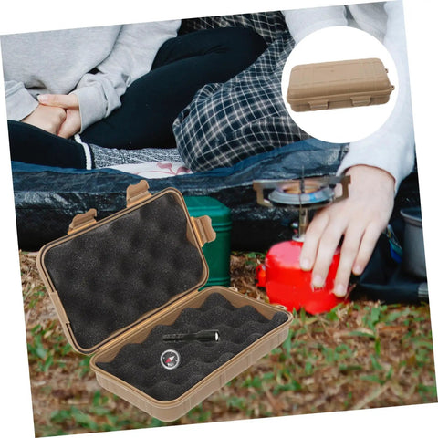 Outdoor Tool Box Multi Function Storage Case with shockproof survival container open on grass during camping, close-up view