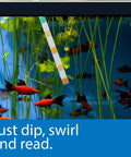 Hella Reliable 5In1 Aquarium Test Strips Keep Your Freshwater And Saltwater Tanks Flopping Smooth Checks PH Nitrite Nitrate Hardness 100 Count in an aquarium with red fish and plants.