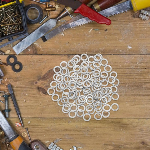 100 Pcs M8 Stainless Steel Split Ring Lock Washers Kit For Bolts And Machinery Fastening Applications Heavy Duty Spring Metal Washers For Auto DIY Projects Tools And Equipment on workbench