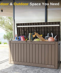 60 Gallon Deck Box Outdoor Storage Waterproof Resin Bin with open lid, holding sports equipment, on a patio
