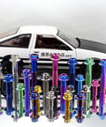 Aviation Grade Built Tough Blue Anodized Gr5 Titanium M8 X 1.25 X 40Mm Hex Flange Head Bolts displayed with a hot rod model.