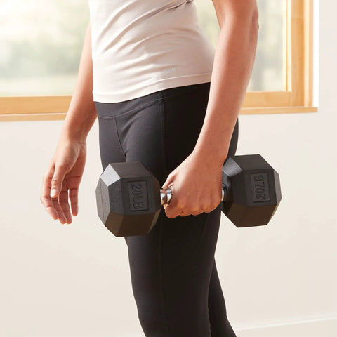 20 Pound Hex Dumbbell With Rubber Encased Cast Iron Core And Non Slip Contoured Handle For Home Gym Strength Training, being held by a person.