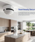 Set It And Forget It Peace Of Mind With This 10 Year Photoelectric Smoke Detector mounted on a ceiling in a modern kitchen.