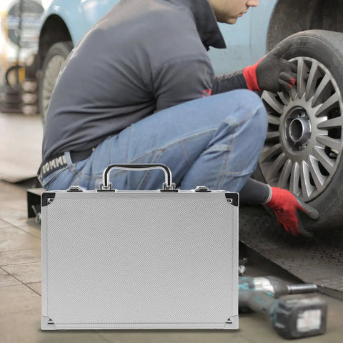 Slick Aluminum Alloy Toolcase Featuring Custom Foam Padding, Sweet Ride Hardshell Carry Box For Power Tools And Electronics Gear, Compact Travel Rig With Secure Latch on workshop floor.