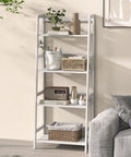 Top Notch Four Tier Bamboo Ladder Shelf Game Changer Plant Stand And Bulk Storage Rack No Sweat Freestanding Organizer in living room