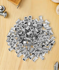 Stainless Steel Flat Head Knurled Rivet Nuts Kit 1/4-20 Thread Rivet Nut Inserts, 120 Pcs on wooden surface