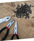 Genuine M4x10mm Carbon Steel Mini Screws With Slick Black Finish For Tight Furniture Build And Hassle Free Diy Home Improvement Projects Rock Solid Bulk Hardware Pack Today with pliers on a wooden surface.