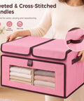 No Hassle Straight Up Foldable Fabric Storage Bins With Tough Lids And Transparent Panels For Rapid Grab Makes Home Sorting A Total Cinch lightweight pink storage bin with cross-stitched handles and clear panel.