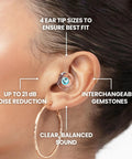 Customizable Gemstone Earplugs With 21 dB Noise Reduction showcasing clear hearing in woman's ear