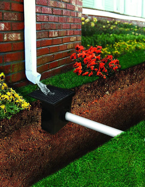 Square Catch Basin Drain Kit With Two Opening Basin Black Plastic Grate Two Outlet Adapters And One Outlet Plug 12 Inch Stormwater Drainage Solution For Yards Patios And Hardscapes installed underground with visible drainage