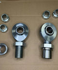Badass 1.25 Inch Chromoly Rod End Heim Joint Kit With Heat Treated Bearings and Hard Chrome Finish on brown background.