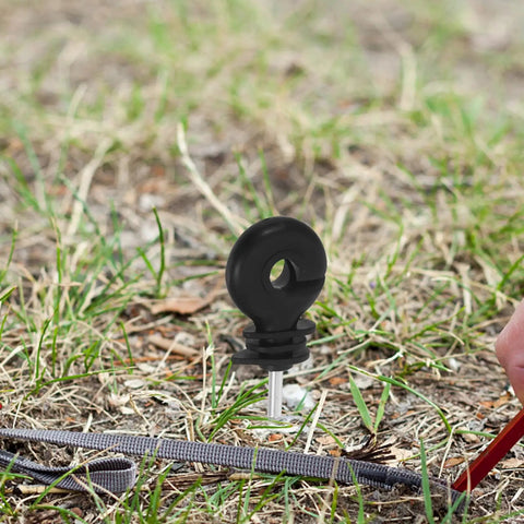 51-Count Wood Post Screw-In Electric Fence Insulators With Socket Installation Tool Farm Ready Durable Black PP And Carbon Steel Sun Resistant And Secure Wire Holding For Livestock installed in grass