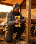 Heavy Duty Cordless Power Drill Packed With Badass High Torque Motor And Snappy Quick Release Chuck For No Sweat Home Woodworking And Knockout DIY Builds Built Like A Tank For Weekend Warriors On The Go, drilling into wood post outdoors.