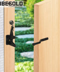Self Locking Gate Latch With Spring Cable Pull For Outdoor Gates Black Gravity Lever Door Latch Built Tough For Wooden Fence Gates Auto Lock Gate Hardware For Pool Garden Shed 1 Pack installed on wooden gate.