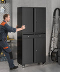 Man moving a Beefy Heavy Duty Metal Garage Storage Cabinet On Wheels With Locking Doors, Two Drawers, Three Adjustable Shelves.